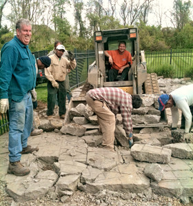 A Todd Greenstone crew at work on replacing a paver surface.